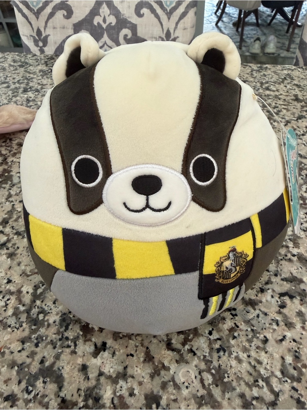 Squishmallows Hufflepuff Badger Plush in cream, black, yellow